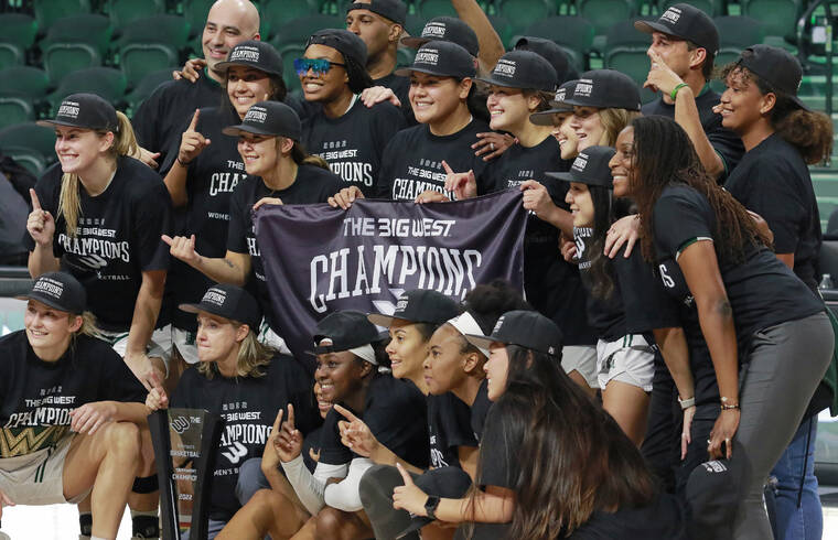 ASSOCIATED PRESS
                                Hawaii players celebrate after winning the Big West Conference tournament.