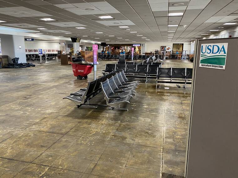 COURTESY HAWAII STATE DEPT. OF TRANSPORTATION Water from a broken air conditioner chiller line early this morning caused damage between gates A13 to A17 at Daniel K. Inouye International Airports Terminal 1. Cleanup efforts and repairs are underway.