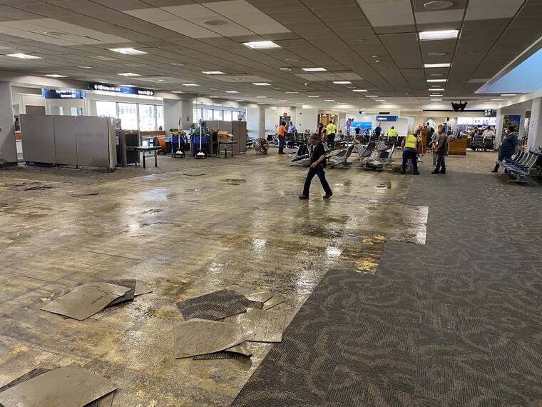 COURTESY HAWAII STATE DEPT. OF TRANSPORTATION Water from a broken air conditioner chiller line early this morning caused damage between gates A13 to A17 at Daniel K. Inouye International Airports Terminal 1. Cleanup efforts and repairs are underway.