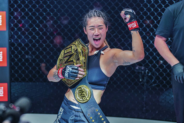 COURTESY ONE CHAMPIONSHIP 
                                Angela Lee celebrated her second-round submission of Stamp Fairtex to retain her atomweight world title on Saturday.