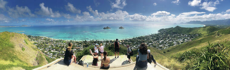 CRAIG T. KOJIMA / CKOJIMA@STARADVERTISER.COM
                                The popular hiking path leads to two coast arti­llery observation stations, more commonly known as pillboxes. Above, people atop one of the pillboxes.