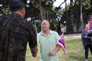 JAMM AQUINO / JAQUINO@STARADVERTISER.COM
                                Sparky Rodrigues, right, co-founder of Malama Makua, shakes hands with U.S. Rep. Kai Kahele during a news conference today at Thomas Square in Honolulu. Rodrigues is the husband of Leandra Wai and the Leandra Wai Act is named in honor of the late co-founder of Malama Makua.