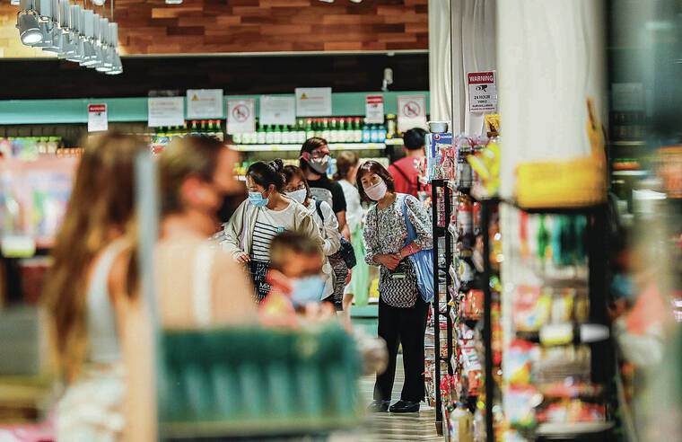 JAMM AQUINO / JAQUINO@STARADVERTISER.COM
                                Hawaii’s mask mandate is set to expire tonight at 11:59 p.m. Shoppers wore masks Thursday inside the Mitsuwa Japanese grocery store at the International Market Place in Waikiki.