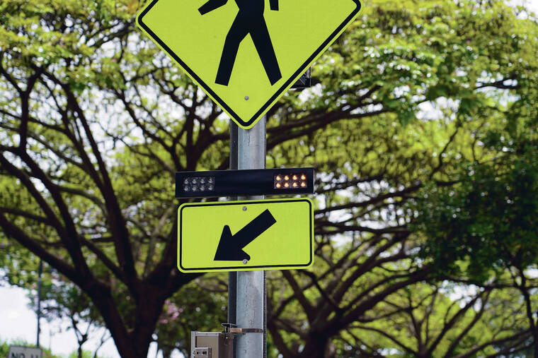 Pedestrian-activated crossing beacon installed in Kailua.