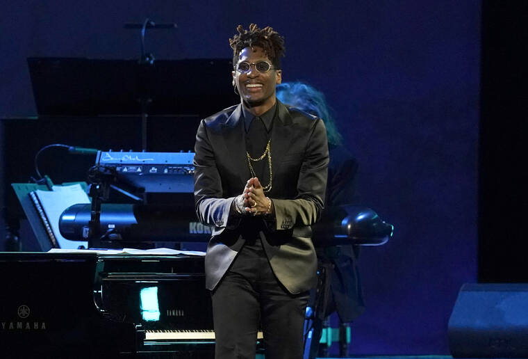 ASSOCIATED PRESS
                                Jon Batiste performs a medley at the 31st annual MusiCares Person of the Year benefit gala honoring Joni Mitchell on Friday at the MGM Grand Conference Center in Las Vegas.
