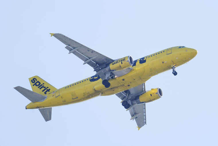 ASSOCIATED PRESS / OCTOBER 2021
                                A Spirit Airline aircraft flying over Gloster City, N.J., approaches Philadelphia International Airport. JetBlue Airways has offered to buy Spirit Airlines for about $3.6 billion and break up a plan for Spirit to merge with rival budget carrier Frontier Airlines. Spirit said Tuesday, April 5, 2022, that its board will evaluate the JetBlue bid and decide what’s best for its shareholders.