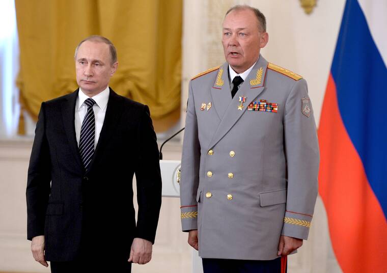 ASSOCIATED PRESS
                                In this photo taken on March 17, 2016, Russian President Vladimir Putin, left, poses with Col. Gen. Alexander Dvornikov during an awarding ceremony in Moscow’s Kremlin, Russia.
