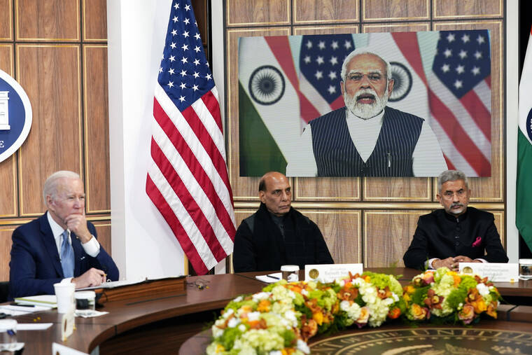 ASSOCIATED PRESS
                                President Joe Biden meets virtually with Indian Prime Minister Narendra Modi in the South Court Auditorium on the White House campus in Washington. Indian Minister of Defense Rajnath Singh is center, Minister of External Affairs Subrahmanyam Jaishankar is right.