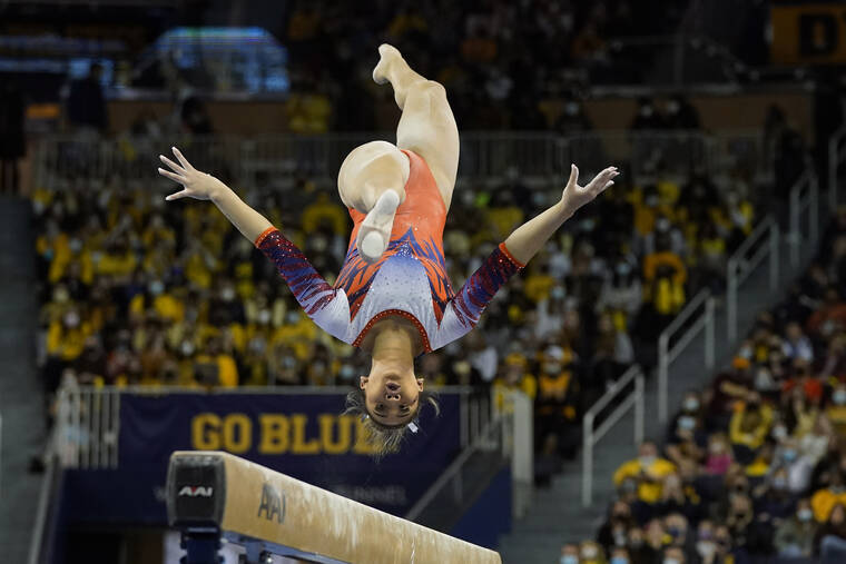 ASSOCIATED PRESS
                                Auburn gymnast Sunisa Lee performs during a meet at the University of Michigan on March 12.