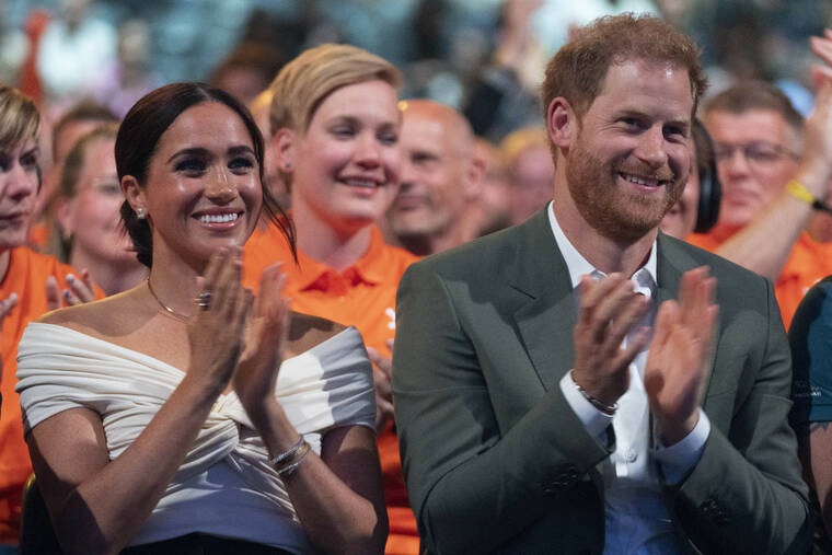 POOL / AP
                                Prince Harry and Meghan Markle, Duke and Duchess of Sussex, attend the opening ceremony of the Invictus Games venue in The Hague, Netherlands, Saturday.