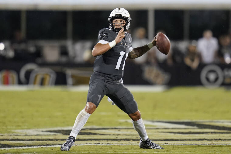 ASSOCIATED PRESS
                                Central Florida quarterback Dillon Gabriel looks for a receiver during a game against Bethune-Cookman on Sept. 11.