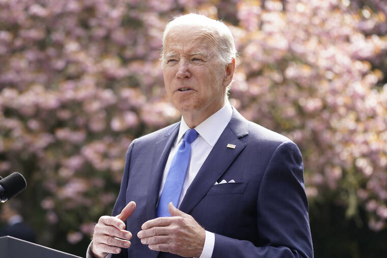 ANDREW HARNIK / AP
                                President Joe Biden speaks at Seward Park on Earth Day, Friday in Seattle.