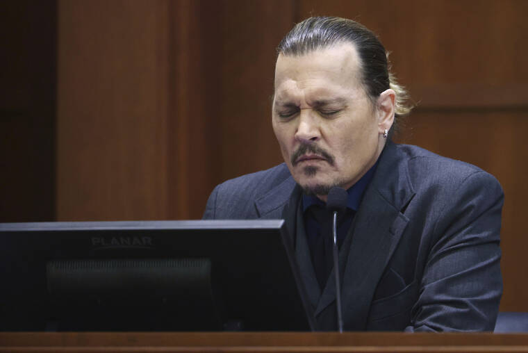 JIM LO SCALZO/POOL PHOTO VIA ASSOCIATED PRESS
                                Actor Johnny Depp testified at the Fairfax County Circuit Court in Fairfax, Va., April 21. Depp sued his ex-wife Amber Heard for libel in Fairfax County Circuit Court after she wrote an op-ed piece in The Washington Post in 2018 referring to herself as a “public figure representing domestic abuse.”