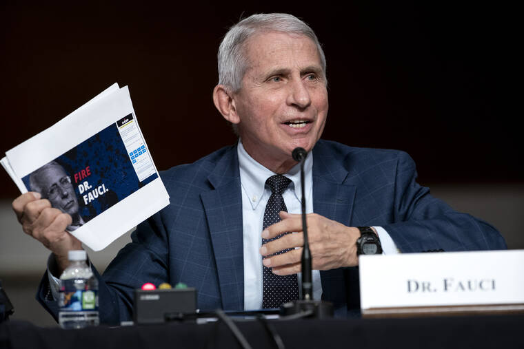 GREG NASH/POOL VIA ASSOCIATED PRESS Dr. Anthony Fauci, director of the National Institute of Allergy and Infectious Diseases and chief medical adviser to the president, spoke during a Senate Health, Education, Labor, and Pensions Committee hearing, Jan. 11, on Capitol Hill in Washington. Speaking Tuesday night on PBS NewsHour, Fauci said the global pandemic isnt over but the U.S. currently is out of the pandemic phase. But it doesnt mean the coronavirus threat to Americans has ended.