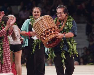 STAR-ADVERTISER / 2016
                                Johnny Lum Ho holds the Merrie Monarch Festival first-place trophy in the auana division, which he won with Kasie Kaleohano. The kumu hula died Sunday at age 81.