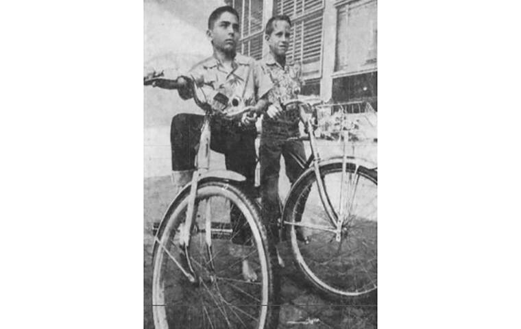 STAR-ADVERTISER
                                Bruce Marnie, left, and Jim Lucas biked around Oahu in 1961 in 2-1/2 days. They were 10 and 11 years old. Jim’s dad followed in the car.