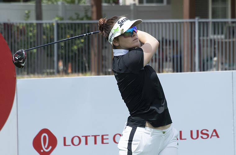 CRAIG T. KOJIMA / CKOJIMA@STARADVERTISER.COM Lotte Championship leader, Hannah Green, on the second hole tee at Hoakalei.