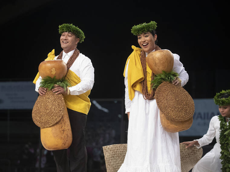 CINDY ELLEN RUSSELL / CRUSSELL@STARADVERTISER.COM
                                Kumu ʻIliahi and Haunani Paredes of Hālau Kekuaokalāʻauʻalaʻiliahi perform on stage during Kyleigh Hōkūao Manuel-Sagon’s performance of “Neʻeneʻe Mai ʻO Kaʻula” in the hula kahiko portion of the Miss Aloha Hula competition on Thursday.