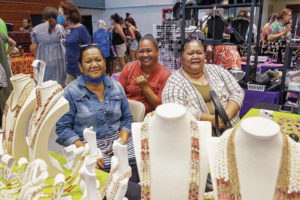CINDY ELLEN RUSSELL / CRUSSELL@STARADVERTISER.COM
                                Auntie Annie Kanahele, top left, Peggy Kaohelaulii and Hiipoi Kanahele sat with their handmade Niihau shell lei for sale Wednesday at their Ehulani Ohana Niihau Shell Lei booth during the Merrie Monarch Hawaiian Arts and Crafts Fair being held at the Afook-Chinen Civic Auditorium and Butler Buildings in Hilo.