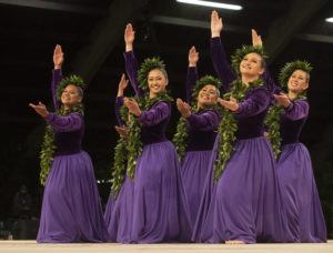 CINDY ELLEN RUSSELL / CRUSSELL@STARADVERTISER.COM
                                Hālau Ka Lei Mokihana O Leināʻala, under the direction of Kumu Leināʻala Pavao Jardin, from Kalāheo, Kauaʻi, performs “Kauaʻi Lana I Ke Kai” in the hula ʻauana competition on Saturday.