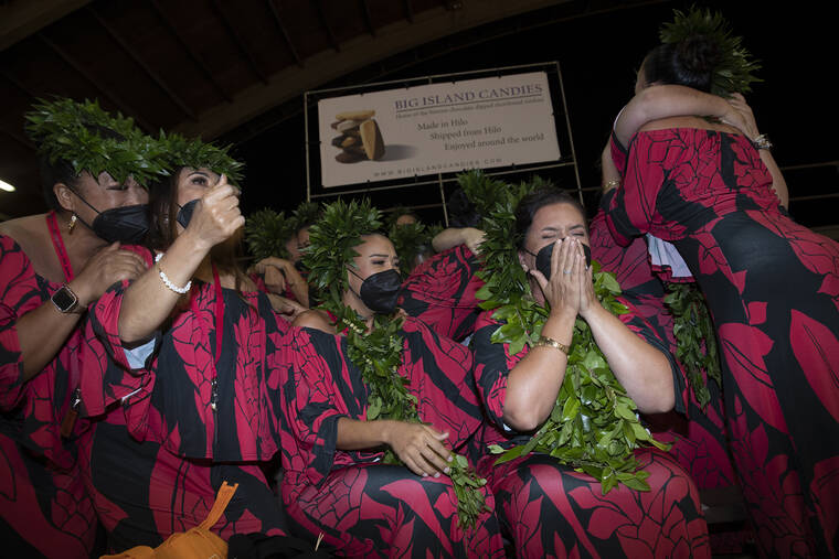 CINDY ELLEN RUSSELL / CRUSSELL@STARADVERTISER.COM
                                Kumu Leināʻala Pavao Jardin, right, reacts with members of Hālau Ka Lei Mokihana O Leināʻala after it was announced that they won first place in the wahine kahiko competition. The halau also placed first in the wahine ‘auana competition and first place overall.