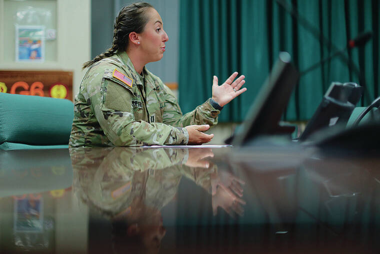 JAMM AQUINO / JAQUINO@STARADVERTISER.COM
                                The new policies will affect soldiers under her command, says Army Capt. Kelly Boursinos, pictured above. “It allows that umbrella of protection for my pregnant and postpartum soldiers for up to a year of their baby’s life that they don’t have that added stress or to worry about.”