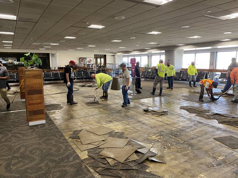 COURTESY HAWAII STATE DEPT. OF TRANSPORTATION
                                The mess created by flooding that occurred around 6:30 a.m. Thursday at the Neighbor Island Terminal A Gate lobby after an air conditioning chiller line broke and thousands of gallons of water poured down.