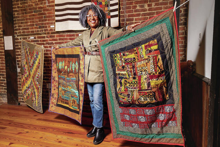 PHILADELPHIA INQUIRER
                                Quilt artist Renata Merrill displays her quilts at Camden FireWorks in Camden, N.J. Her first solo exhibit in February was called “New Beginnings.”