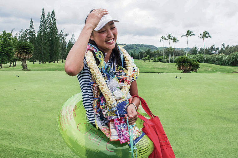 CRAIG T. KOJIMA / 2018
                                Choi won two state golf titles while at Punahou. She broke into a smile after winning in 2018.