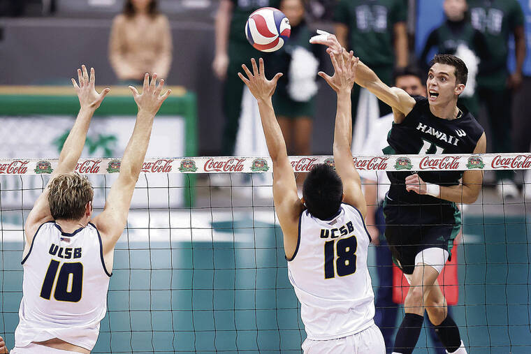 ANDREW LEE / APRIL 9
                                Hawaii’s Dimitrios Mouchlias (11) slams down a kill past UC Santa Barbara’s Brandon Hicks (10) and Patrick Paragas (18) during a NCAA Men’s Volleyball match on Saturday, April 9, 2022, at SimpliFi Arena at Stan Sheriff Center in Honolulu, Hawaii.