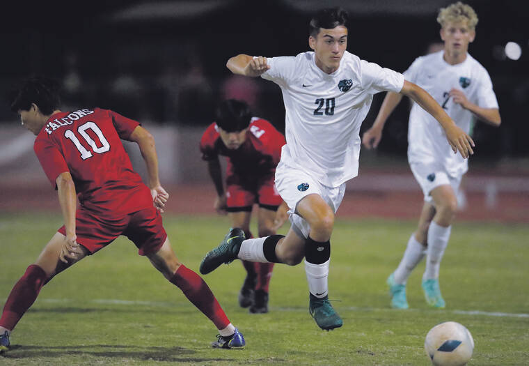 JAMM AQUINO / JAQUINO@STARADVERTISER.COM
                                King Kekaulike’s Bailey Hofmann got around Kalani players during a semifinal of the HHSAA boys soccer tournament on March 4. Hofmann, a sophomore midfielder, left Maui for Munich to train with the Munich Fussball Academy in hopes of signing a professional soccer contract.