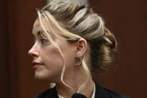 Amber Heard cross-examined in Depp defamation suit