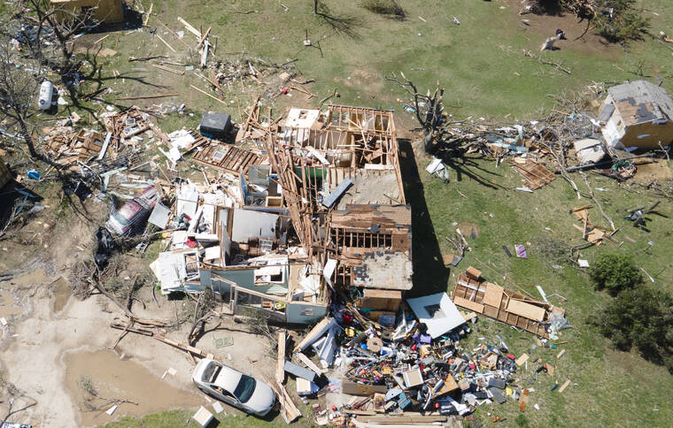 JAIME GREEN/THE WICHITA EAGLE VIA AP / APRIL 30
                                A home is destroyed from a possible tornado the next before near Andover, Kan. A suspected tornado that barreled through parts of Kansas has damaged multiple buildings, injured several people and left more than 6,500 people without power.