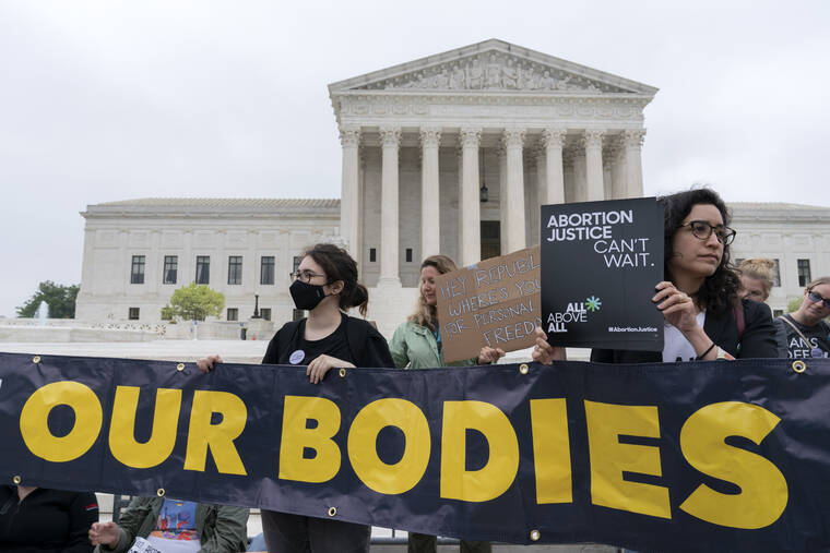 ASSOCIATED PRESS
                                Demonstrators protested outside of the U.S. Supreme Court, today, in Washington. A draft opinion suggests the U.S. Supreme Court could be poised to overturn the landmark 1973 Roe v. Wade case that legalized abortion nationwide, according to a Politico report released Monday.