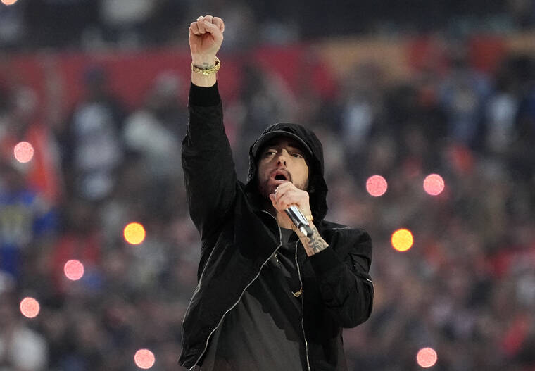 ASSOCIATED PRESS
                                Eminem performed during halftime of the NFL Super Bowl 56 football game between the Los Angeles Rams and the Cincinnati Bengals, in February 2022, in Inglewood, Calif. The rapper has been inducted into the Rock & Roll Hall of Fame.