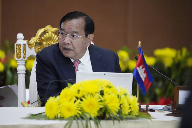 ASSOCIATED PRESS
                                Cambodian Deputy Prime Minister and Special Envoy of the ASEAN Prak Sokhonn opens remark during a meeting on humanitarian assistance to Myanmar in Phnom Penh, Cambodia,.