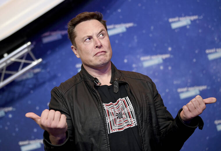 ASSOCIATED PRESS / DEC. 1, 2020
                                SpaceX owner and Tesla CEO Elon Musk, ween here in Berlin, Germany in 2020, indicated today that he could seek to renegotiate his takeover of Twitter Inc.