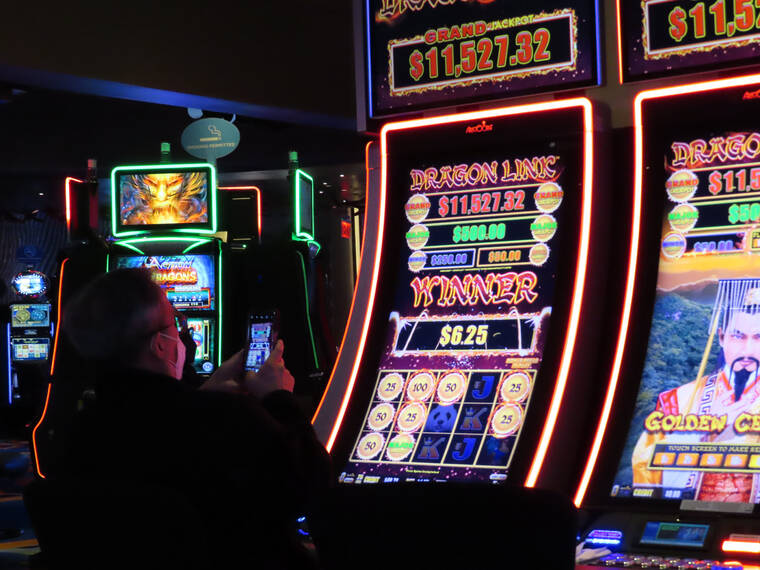 ASSOCIATED PRESS
                                A gambler won at a slot machine at the Ocean Casino Resort in Atlantic City, N.J., Feb. 10. The American Gaming Association said, today, that America’s commercial casinos had their best month ever in March 2022, winning $5.3 billion from gamblers.