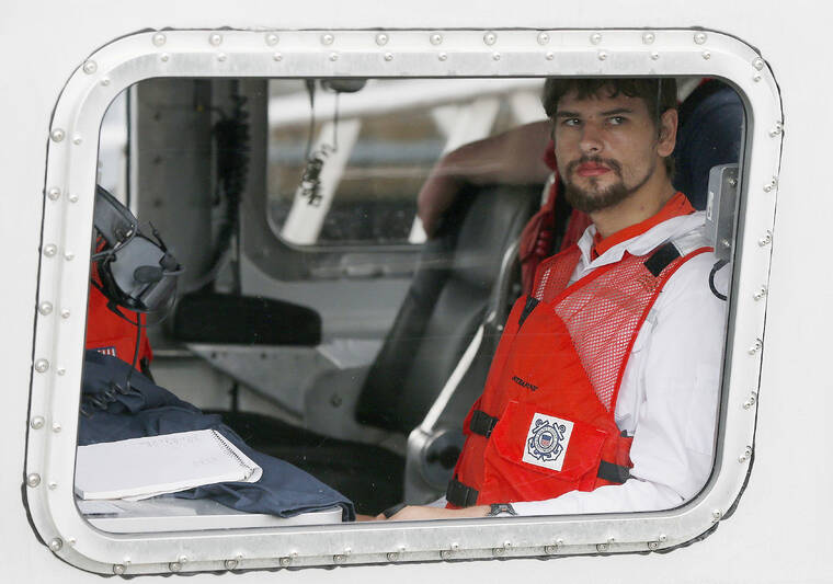 ASSOCIATED PRESS / 2016
                                Nathan Carman arrives in a small boat at the US Coast Guard station, in Boston. Carman spent a week at sea in a life raft before being rescued by a passing freighter.