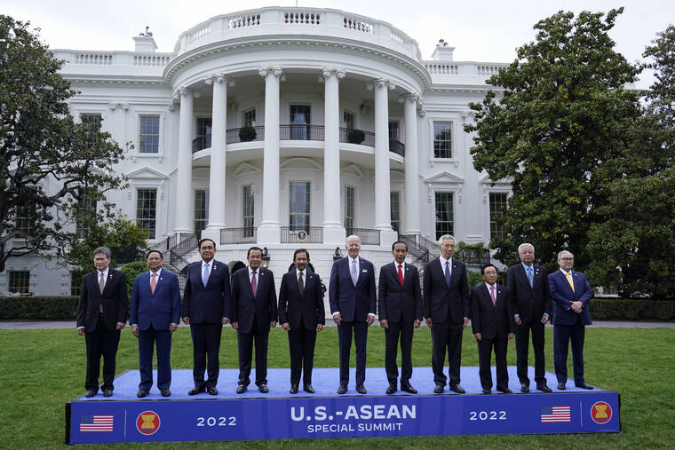 ASSOCIATED PRESS
                                President Joe Biden and leaders from the Association of Southeast Asian Nations (ASEAN) participate in a group photo on the South Lawn of the White House in Washington.
