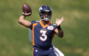 ASSOCIATED PRESS
                                Denver Broncos quarterback Russell Wilson takes part in drills at the NFL football team’s voluntary minicamp on April 27 at the team’s headquarters in Englewood, Colo.