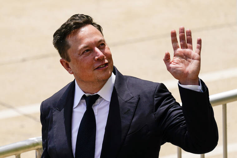 ASSOCIATED PRESS
                                CEO Elon Musk departed from the justice center in Wilmington, Del., July 13. Musk said his planned $44 billion purchase of Twitter is “temporarily on hold” pending details on spam and fake accounts on the social media platform.
