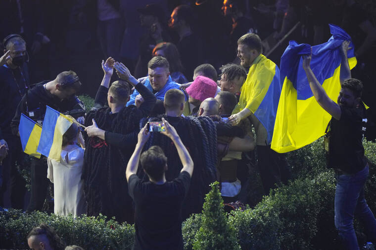 LUCA BRUNO / AP
                                Kalush Orchestra from Ukraine celebrates after winning the Grand Final of the Eurovision Song Contest at Palaolimpico arena, in Turin, Italy.