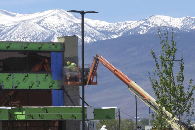 ASSOCIATED PRESS / MAY 13
                                A construction worker works on the exterior of the Legends Bay Casino in Sparks, Nev. The new casino is scheduled to open this summer at The Outlets at Legends shopping center along I-80 next to the Sparks Marina. It will be the first new casino built in the Reno-Sparks area in a quarter-century. Las Vegas-based Circa Sports will operate the sports book inside Olympia Gaming’s 80,000-square-foot casino, which also will include table games, slots and video poker.