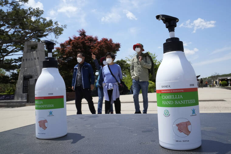 ASSOCIATED PRESS
                                Bottles of hand sanitizer are placed at the Imjingak Pavilion in Paju, South Korea, near the border with North Korea. North Korea has confirmed 15 more deaths and hundreds of thousands of additional patients with fevers as it mobilizes more than a million health and other workers to try to suppress the country’s first COVID-19 outbreak, state media reported Sunday.