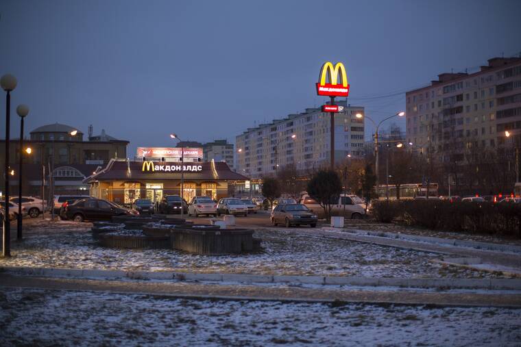 ASSOCIATED PRESS / 2014
                                McDonald’s said today that it has started the process of selling its Russian business, which includes 850 restaurants that employ 62,000 people. The fast food giant pointed to the humanitarian crisis caused by the war, saying holding on to its business in Russia “is no longer tenable, nor is it consistent with McDonald’s values.” Shown here, a McDonald’s restaurant in Dmitrov, a Russian town 47 miles north of Moscow on Dec. 6, 2014.