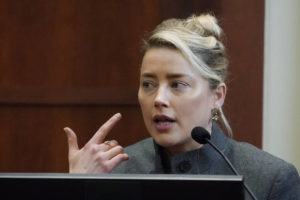 ASSOCIATED PRESS
                                Actor Amber Heard testifies in the courtroom at the Fairfax County Circuit Courthouse in Fairfax, Va. Actor Johnny Depp sued his ex-wife Amber Heard for libel in Fairfax County Circuit Court after she wrote an op-ed piece in The Washington Post in 2018 referring to herself as a “public figure representing domestic abuse.”
