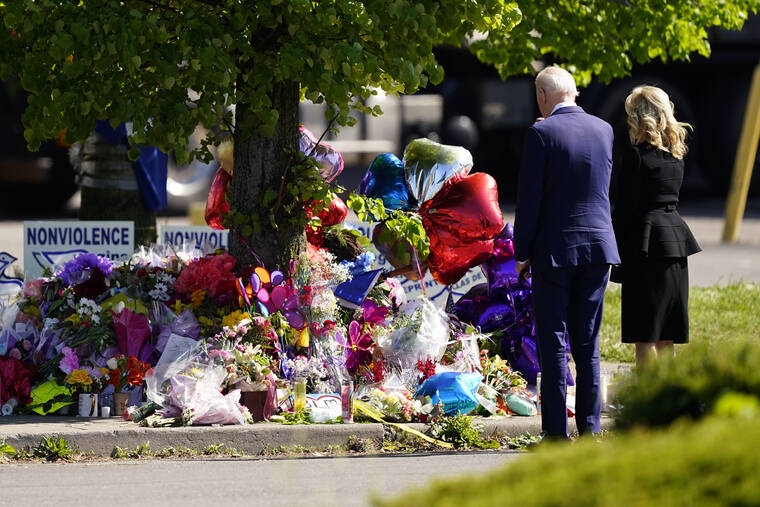 ASSOCIATED PRESS
                                President Joe Biden and first lady Jill Biden visited the scene of a shooting at a supermarket to pay respects and spoke to families of the victims of Saturday’s shooting in Buffalo, N.Y., today.