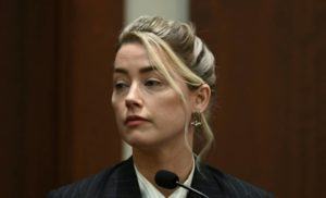 BRENDAN SMIALOWSKI/POOL PHOTO VIA ASSOCIATED PRESS
                                Actor Amber Heard testified in the courtroom at the Fairfax County Circuit Courthouse in Fairfax, Va., today. Actor Johnny Depp sued his ex-wife Amber Heard for libel in Fairfax County Circuit Court after she wrote an op-ed piece in The Washington Post in 2018 referring to herself as a “public figure representing domestic abuse.”
