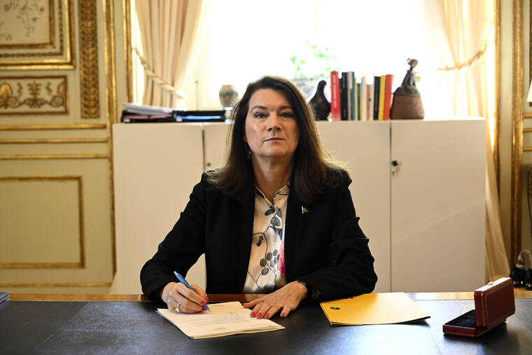 HENRIK MONTGOMERY/TT NEWS AGENCY VIA ASSOCIATED PRESS
                                Swedish Minister of Foreígn Affairs Ann Linde posed for photographers as she signed Sweden’s application for NATO membership at the Ministry of Foreign Affairs, in Stockholm, today. Sweden’s decision to seek NATO membership follows a similar decision by neighboring Finland, a historic shift for the countries, which have been nonaligned for generations.
